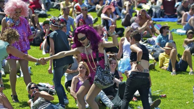 Crowds and performers enjoy the Midsumma Carnival.