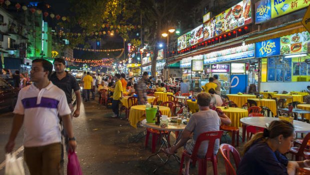 Street food night market on Jalan Alor in Kuala Lumpur.