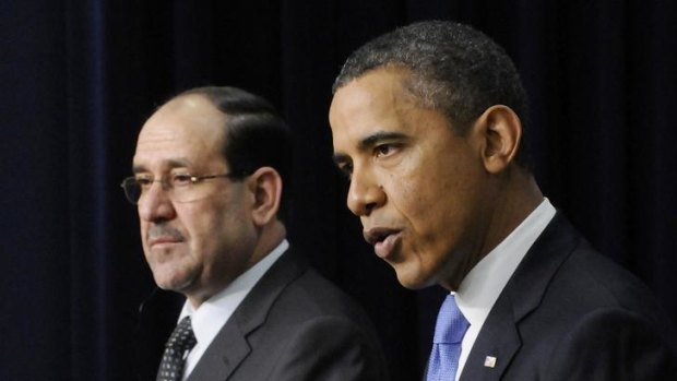 White House talks ... Iraq's Prime Minister Nuri al-Maliki, left, and US President Barack Obama hold a joint news conference.