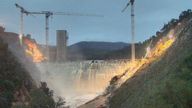 Rare spectacle ... Canberrans flocked to see Cotter Dam overflowing, from Brindabella Road or online at Actew's DamCam.