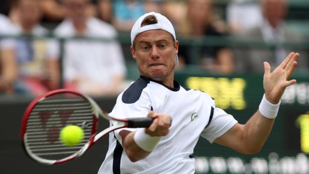 Lleyton Hewitt, pictured in action in his first-round Wimbledon loss to Jo-Wilfried Tsonga, is baffled as to why he has been overlooked for a men's doubles position with Chris Guccione at the London Olympics.