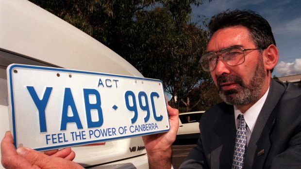 Kerry Kennedy with a Feel the Power of Canberra number plate in 1998.