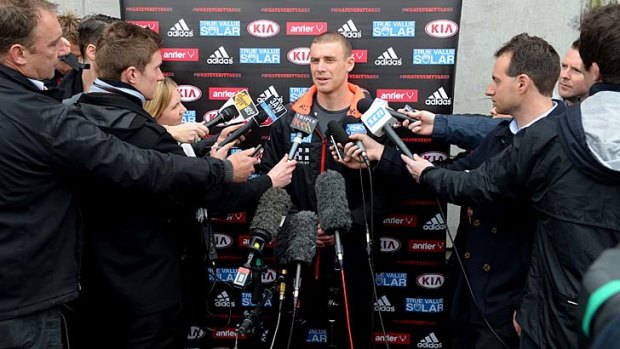 Stand-in: Essendon assistant coach Simon Goodwin speaks to the media on Friday.