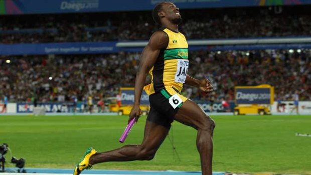 Usain Bolt sprints to victory and a new world record in the men's 4x100 metres relay final during the World Athletics Championships.