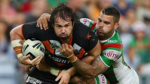 Changed man: After being a Manly fan as a child, Aaron Woods's loyalty now lies with the Wests Tigers.