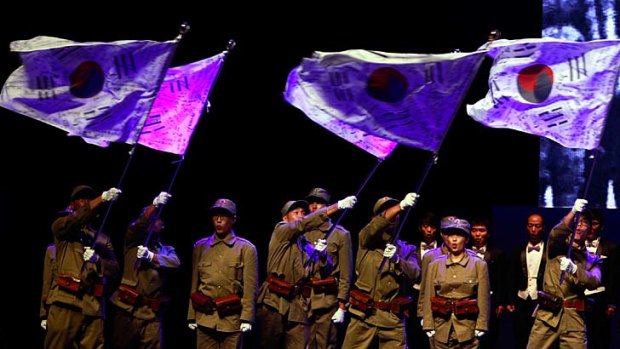 Divisions &#8230; South Koreans perform for Independence Day.
