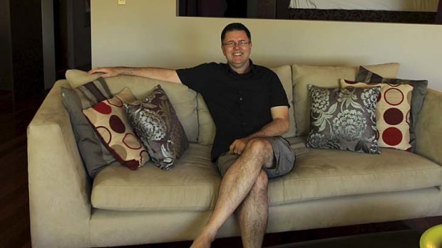 ''It's almost like I am travelling without travelling'': Warren Smith rents out bedrooms in his apartment on Airbnb.