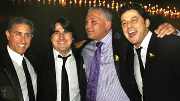 Charity bash ... Peter Barassi, Nick Giannopoulos and Vince Colosimo party with Mick Gatto.