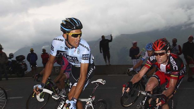 Close check: Cadel Evans (right) is likely to meet Alberto Contador should he make his 2013 debut in the Tour of Oman.