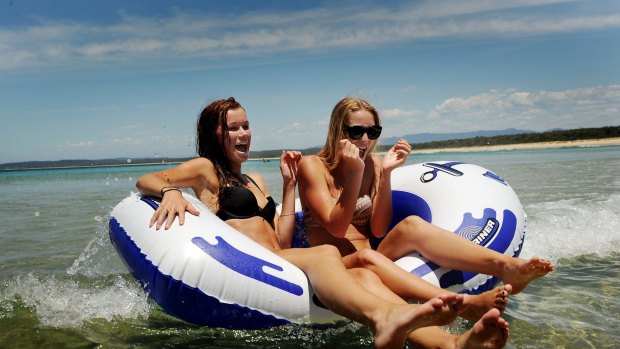 Locals soak up the sun at Broulee beach: South coast beaches are rated as some of the best in Australia