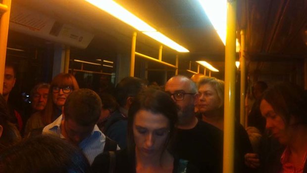 Stuck on the train: passengers were left stranded after a door was accidentally opened.