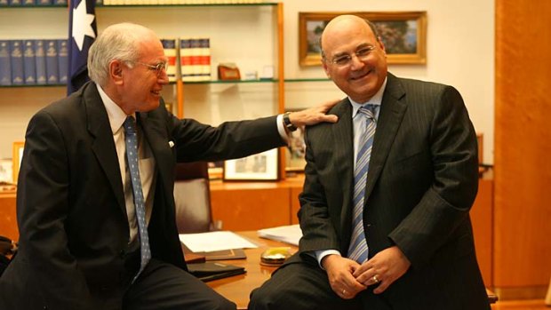Outgoing Chief of Staff Arthur Sinodinos recieves good wishes from the Prime Minister John Howard.
