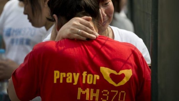 The search goes on: MH370 relatives outside the Malaysia embassy in Beijing in April.