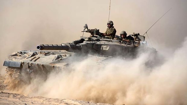 An Israeli Merkava tank rolls near Israel's border with the Gaza Strip  this week.