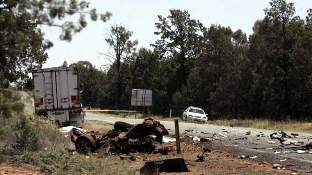 Grim … three people died when their car collided with a truck on the Newell Highway.