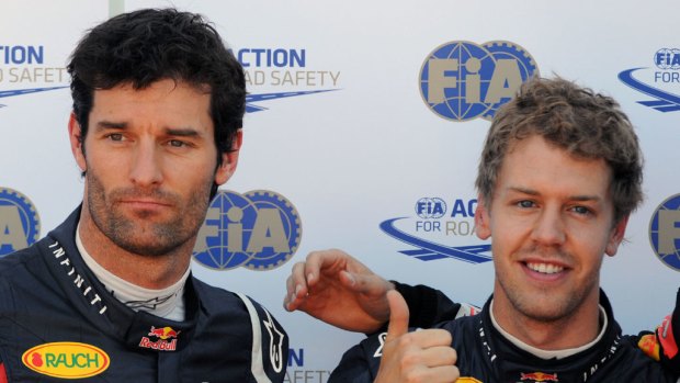 Drive time ... Sebastian Vettel, right, celebrates with Red Bull teammate Mark Webber.