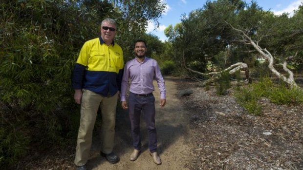 Horticulturalist Stephen Nelson and asylum seeker Mohammad Razeq Shirzad have restored a 1970s garden in Keysborough. The garden  beds represent each of the states of Australia.