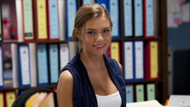 The relentlessly assured and improbably young Indiana Evans is lawyer Tatum Novak in ABC's lightweight legal drama <i>Crownies</i>.