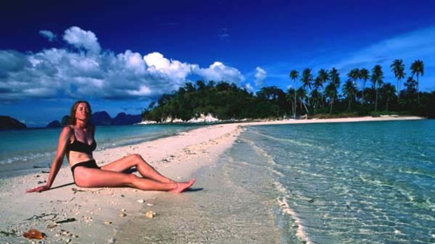 Island hopping ... sunbathing off Palawan island.