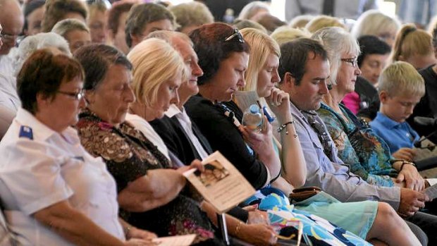 Mourners at the memorial service.