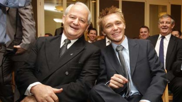 The longest serving Liberal MP, member for Berowra, Philip Ruddock, with 20-year-old member for Longman, Wyatt Roy, during a Liberal Party meeting.