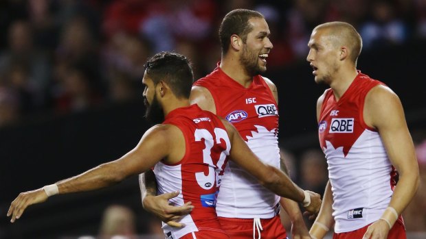 Centre of attention: Lance Franklin, with Lewis Jetta and Sam Reid, is not the target he has been for the Swans.