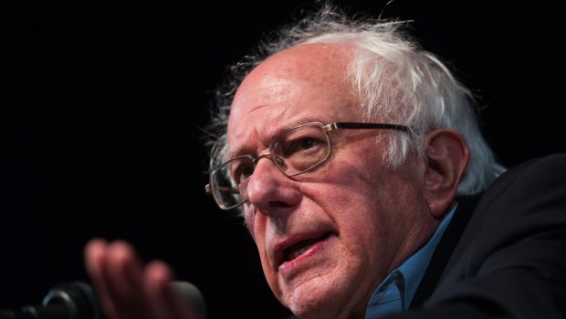 Senator Bernie Sanders speaks to a crowd while campaigning for Democratic presidential candidate Hillary Clinton