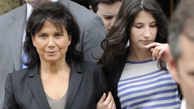 Fighting "tooth and nail" ... Anne Sinclair outside court with Dominique Strauss-Kahn's daughter Camille.