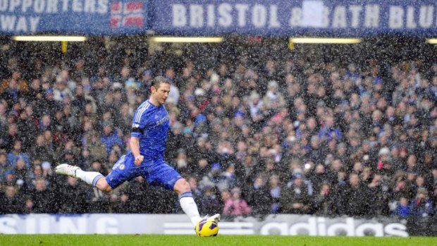 Frank Lampard scores Chelsea's second goal against Arsenal.