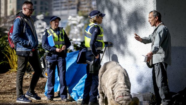 The Melbourne City Council and Police moves the homeless people and their belongings away from the Enterprize Park. 29 June 2016. The Age NEWS. Photo: Eddie Jim. (Godwin Aquilina and his ram)