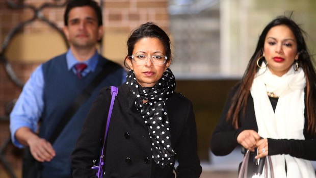 Dr Maha Qidwai enters the NSW Supreme Court for the murder trial of Tony Halloun, who is accused of killing Dr Qidwai's mother.