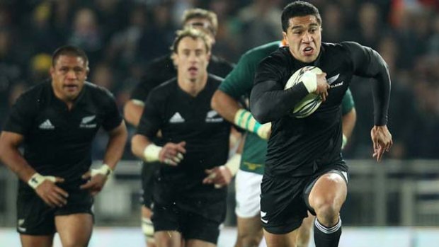 Back to best . . . All Blacks fullback Mils Muliaina makes a break during the side's Tri Nations win over the Springboks at Eden Park.
