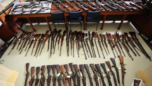 Police seized about 150 guns from a Mt Morgan property in central Queensland.