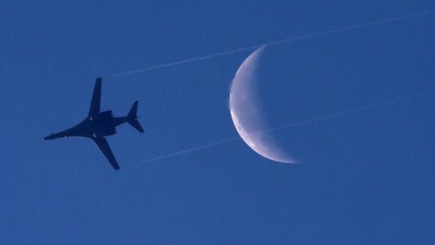 A US Air Force B1-B bomber plane flies above the Syrian town of Kobane.