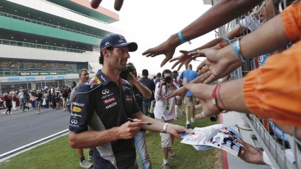 Mark Webber chats to fans at the Buddh International Circuit in Greater Noida on the outskirts of New Delhi.