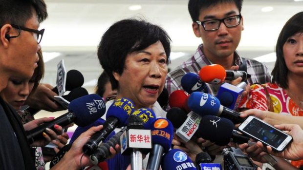 "It's chaotic on the scene" ... The Director of Taiwan's Civil Aeronautics Administration (CAA) Jean Shen speaks to media at the Sungshan airport in Taipei about the TransAsia crash.