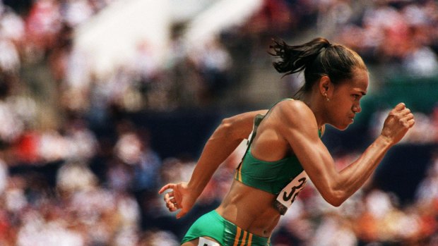 One of Australia's greatest athletics stars, Cathy Freeman running at the Atlanta Olympics.