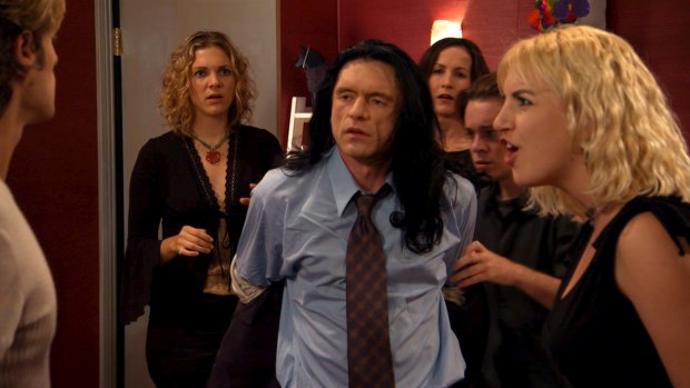 The real Tommy Wiseau in The Room.