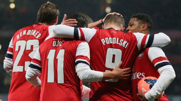 Dominant: Lukas Poldoski and his Arsenal teammates.
