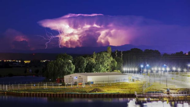 An electrical storm moves over Canberra... photo sent in for the <a href="http://www.canberratimes.com.au/act-news/snapshot-of-summer-can-be-golden-20140129-31mz3.html">Canberra Times Summer Photo Competition</a>.