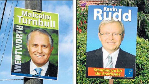 No frills brand . . . campaign posters for Malcolm Turnbull and Kevin Rudd missing their respective party logos.