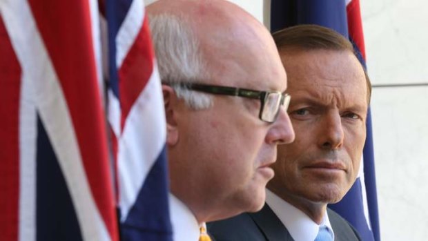 Prime Minister Tony Abbott and Attorney-General George Brandis announce a royal commission on union corruption.
