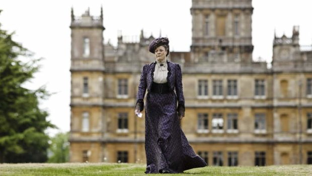 Wandering lonely ... Maggie Smith, who plays Violet Crawley, walks the lawns in search of a few more viewers.