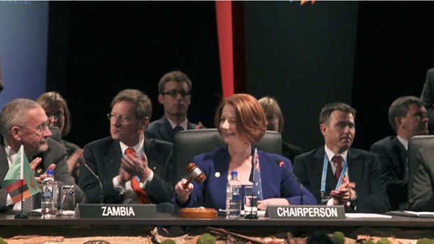Australian Prime Minister Julia Gillard closes the meeting on the final day of the Commonwealth Heads of Government Meeting in Perth.
