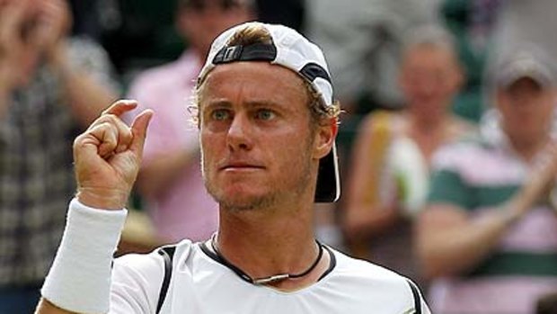 Closing the gap ... Lleyton Hewitt is on a charge at Wimbledon.