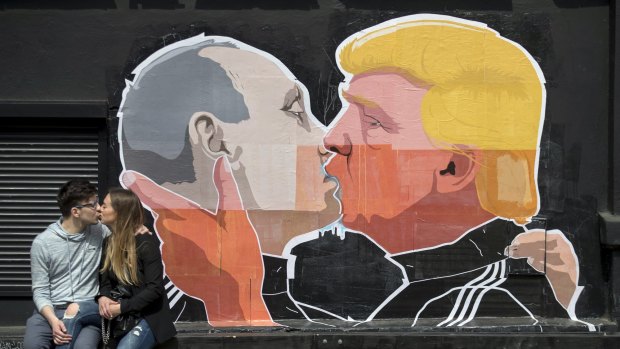 Election-era street art in Lithuania purports to show the extent of the special relationship between Vladimir Putin and Donald Trump.