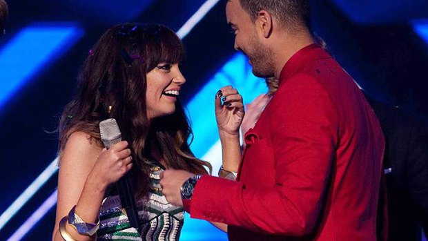 <i>X Factor</i> winner Samantha Jade with Guy Sebastian.