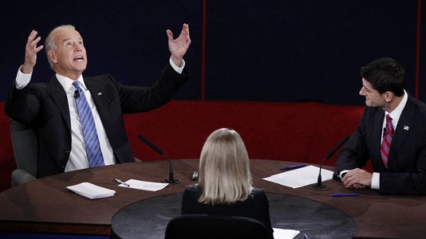 Flamboyant ... Joe Biden makes an extravagant point during the debate with Paul Ryan, moderated by Martha Raddatz.