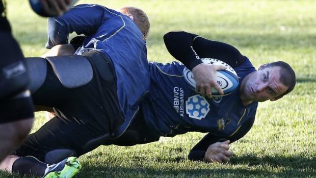 Scott Fardy is taken to ground during training on Monday.