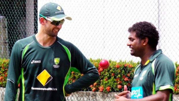 Murali talks shop with Australian spinner Nathan Lyon.